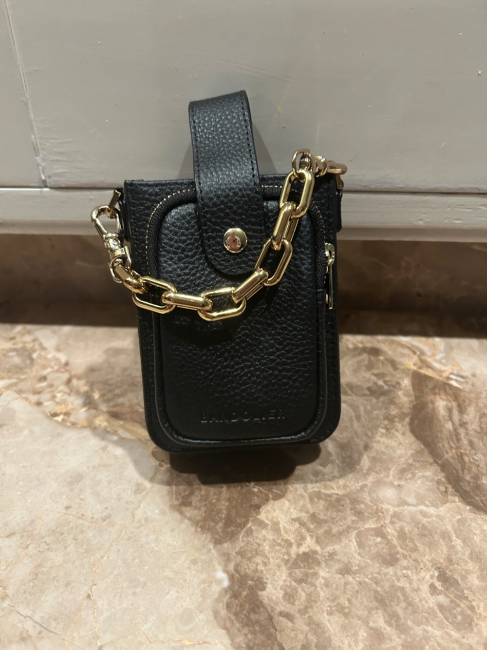 Bandolier Black Pebbled Leather Crossbody Phone Pouch with Gold Hardware